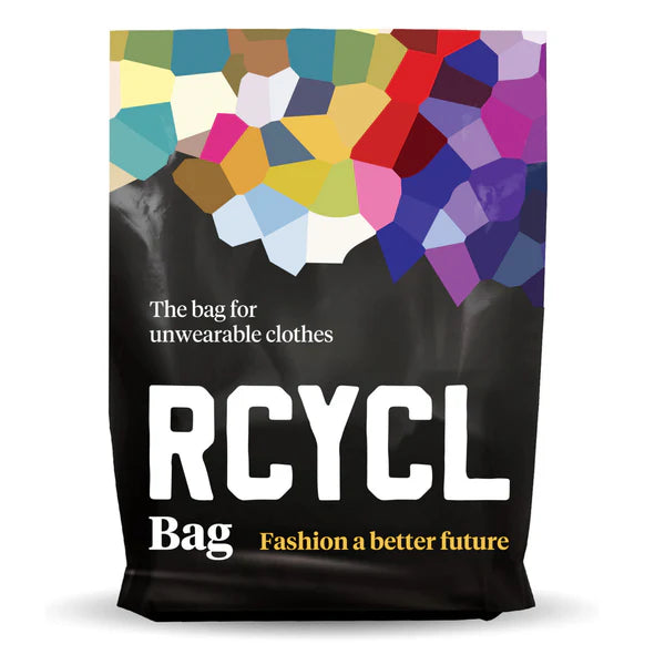 A black RCYCL Bag with bold white text reading “RCYCL” and the tagline “The bag for unwearable clothes.” The top of the bag is decorated with a colorful mosaic pattern. Below, in smaller text, it reads “Bag – Fashion a better future,” emphasizing the bag’s purpose in sustainable fashion and clothing recycling.