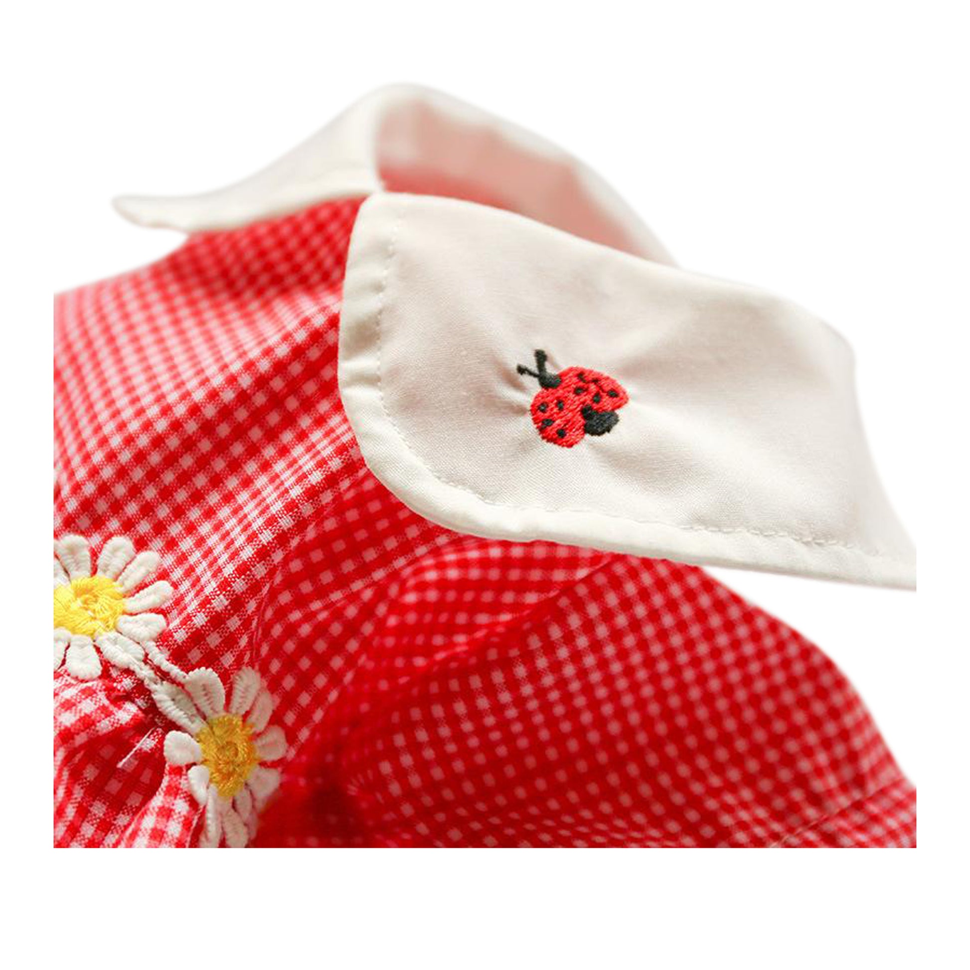 Soft light-weight red cotton dress with flowers at the waist and a Lady bug embroidered on the collar
