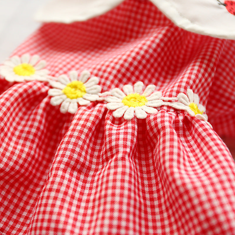 Soft light-weight red cotton dress with flowers at the waist and a Lady bug embroidered on the collar