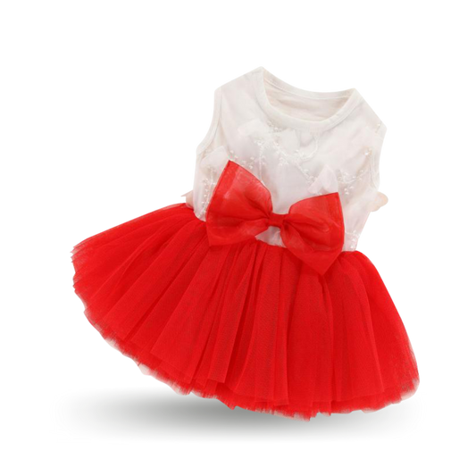 Soft cotton bodice with a fine embroidered mesh overlay, with pretty multi-layered red tulle skirt and red tulle bowtie at the waist